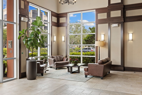 Fort Myers business center lobby with lounge seating, polished interiors and welcoming office environment.